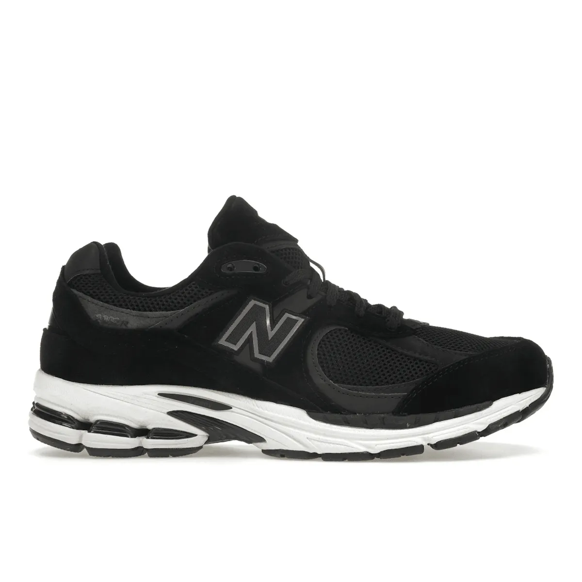 New Balance 2002R Black Gunmetal light colors dusty environment