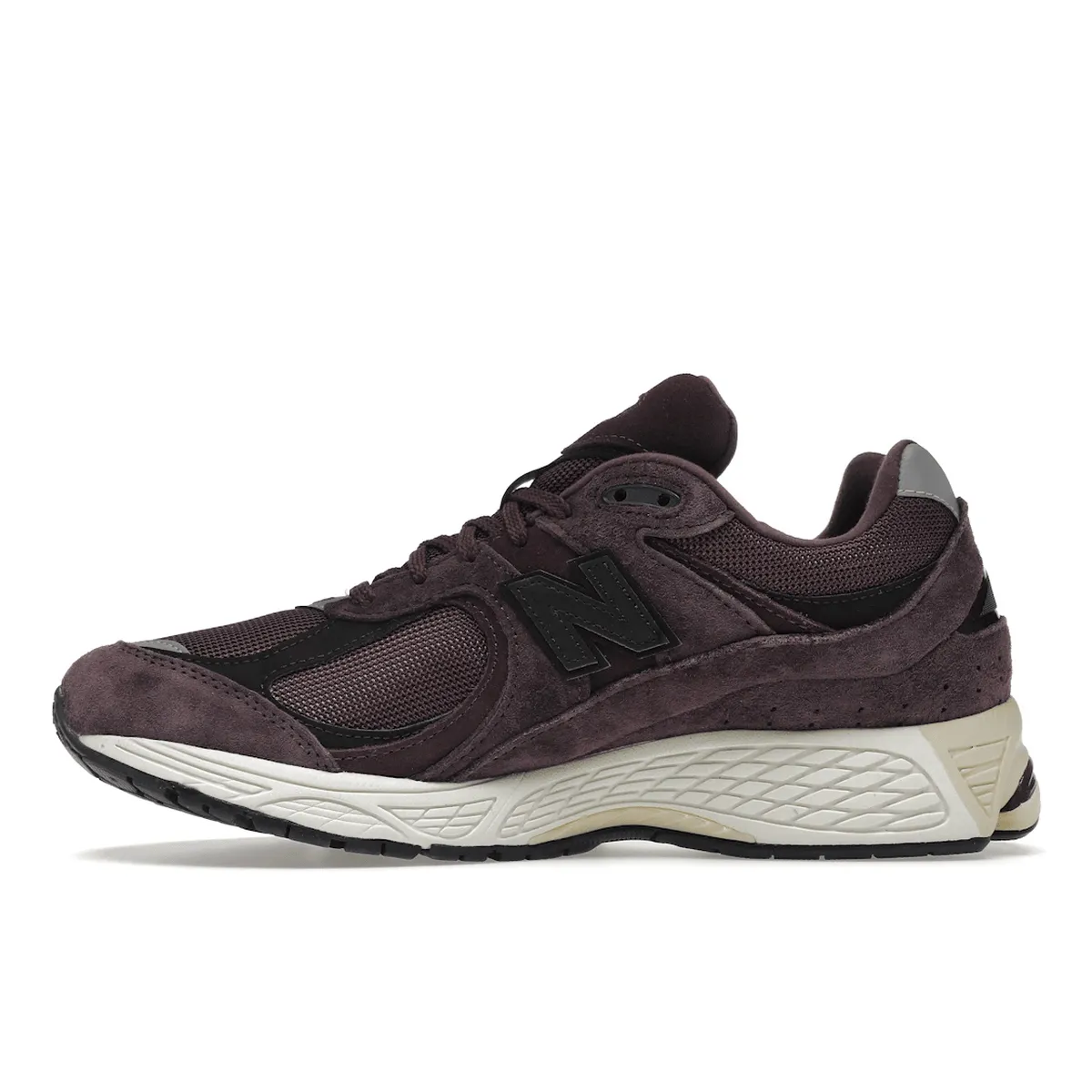 Touching New Balance 2002R Dark Grape
