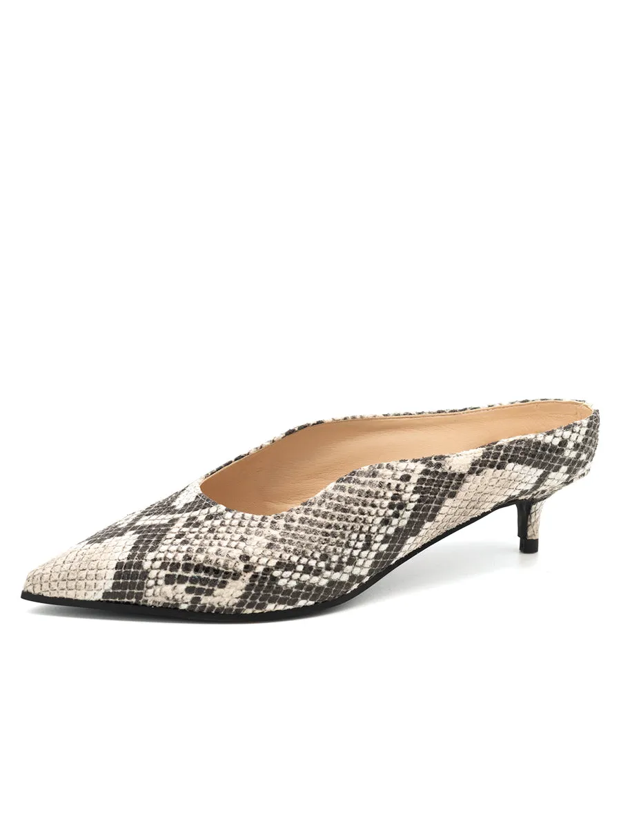 Siren Pointed Toe Mule Edgy Fashionable Design