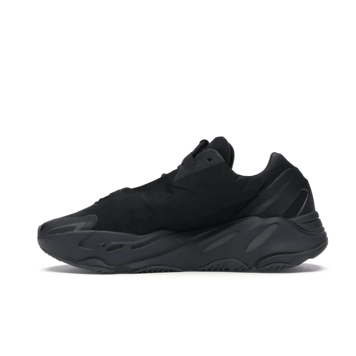 Playing Slip On Adidas Yeezy Boost 700 MNVN Triple Black